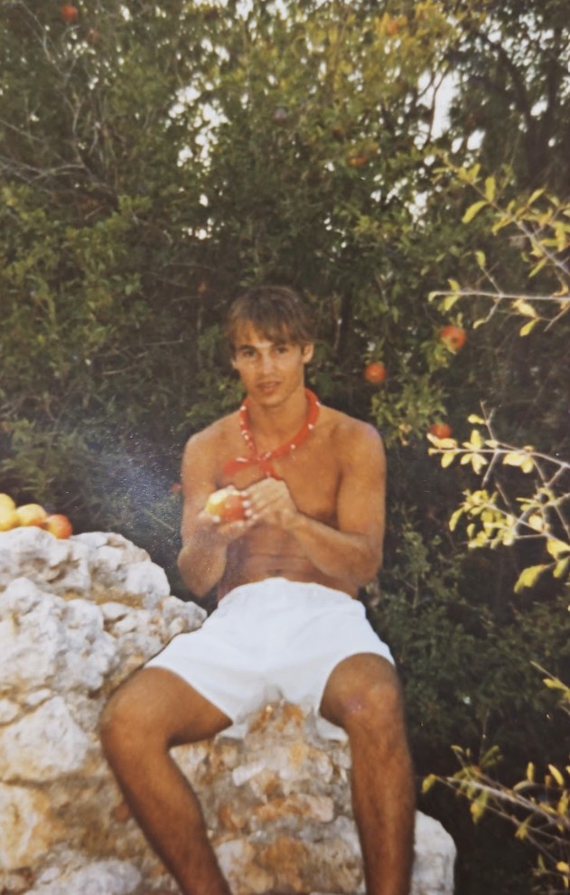 Avi Bandana Eating Pomegranate in Greace