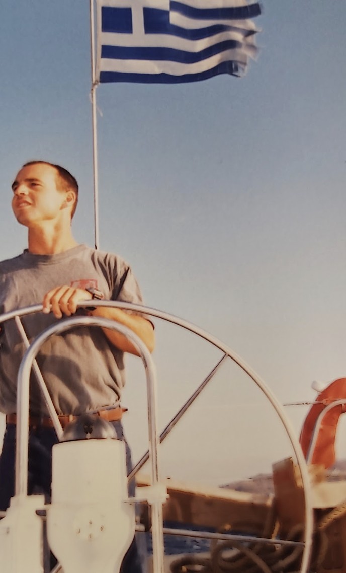 Avi Bandana sailing a yacht